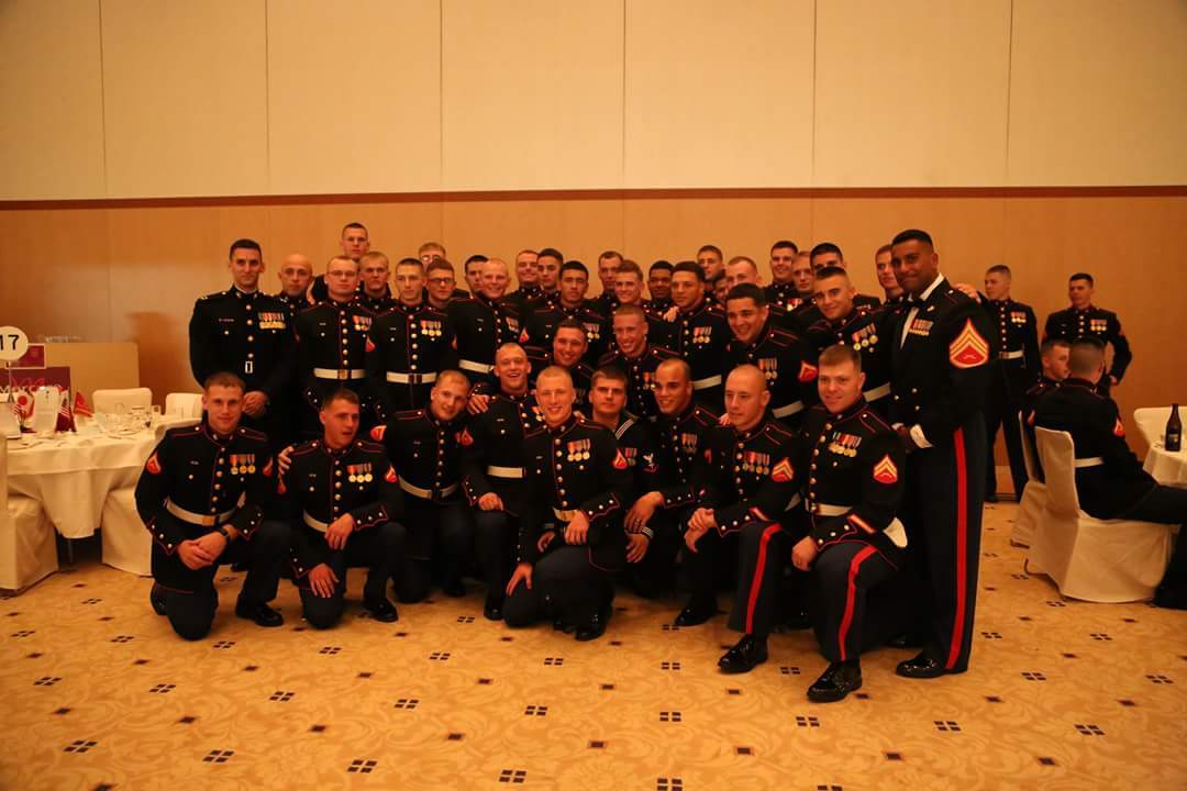 A picture of the military persons posing for a picture