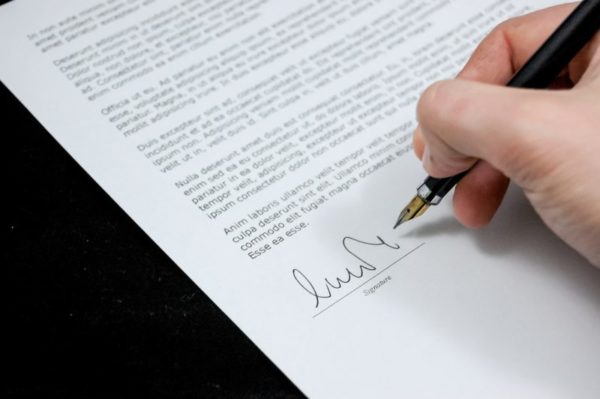 A picture of the person signing the document